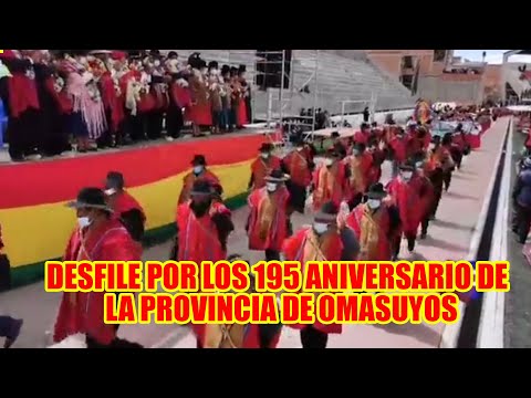 DESFILE DE LAS ORGANIZACIONES SOCIALES A LA C4BEZA DE LOS PONCHOS ROJOS..