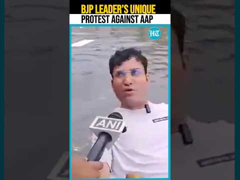 Delhi Rains: BJP Leader Rows Through Drain Water In Inflatable Boat, Slams AAP