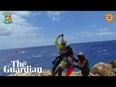 Two dead and 57 rescued after migrant boats sink off Lampedusa in Italy