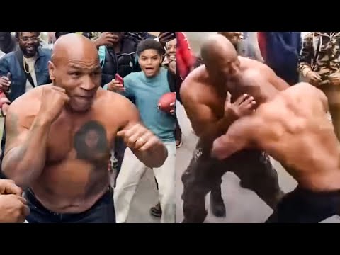 Mike tyson nearly beats the sh*t out of shannon briggs for grabbing him; throws down in the streets