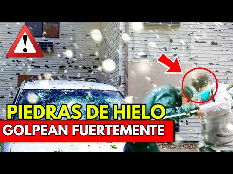 CAE HIELO DEL CIELO SOBRE ESPAÑA Y ROMPE LAS VENTANAS Y AUTOS, PIEDRAS DE HIELO CAEN EN HUESCA