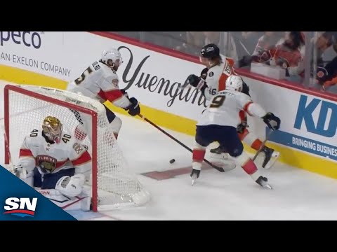 Flyers Zegras Evades Two Panthers Behind The Goal To Set Up Couturier