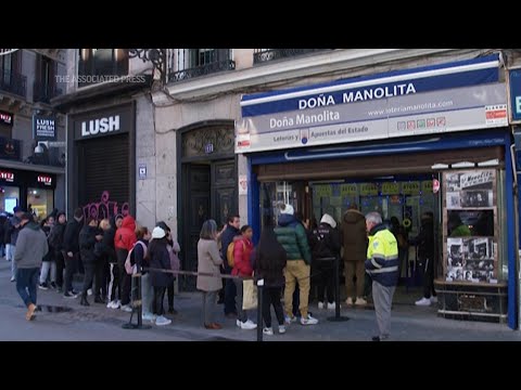 Long lines as hopeful queue up to buy tickets for Spain's bumper Christmas lottery