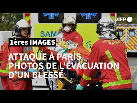 Attaque à l'arme blanche à Paris: les pompiers évacuent un blessé | AFP Images