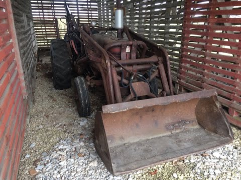 International Harvester 300 Utility Tractor with front end loader and backhoe