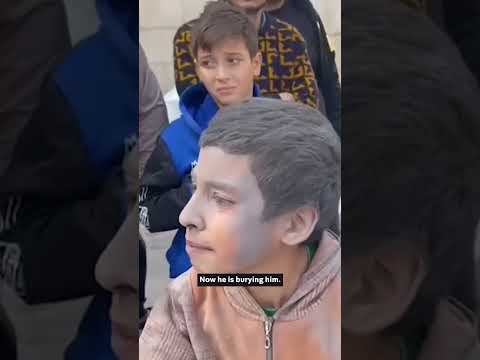 Gazan boy cries to be buried with his brother