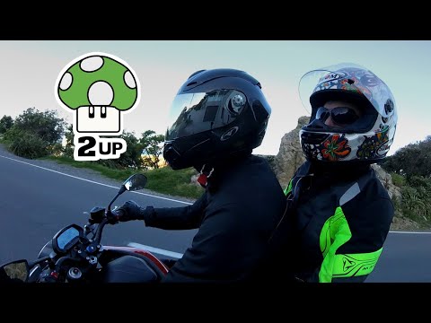 Riding an Electric Motorcycle with a Passenger