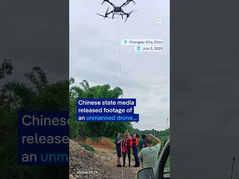 Drone rescues man from flooded river in China | DW News