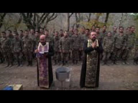 Priest baptises new recruits in Nagorno-Karabakh