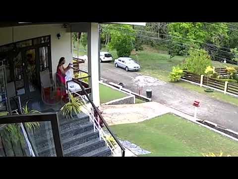 CCTV captured bandits attempting to rob a woman who was sitting outside her home in Maracas