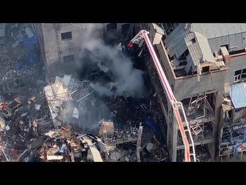 An explosion in a building outside Beijing kills 1 person and injures 22
