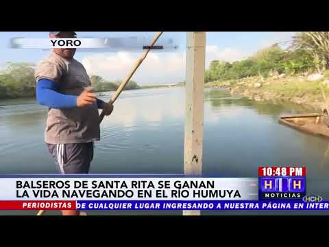 Balseros de Santa Rita se ganan la vida navegando el río Humuya