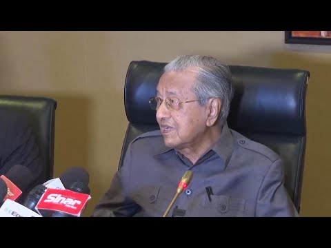 Malaysia ex-PM Mahathir says graft probes into son, associate's wealth politically motivated