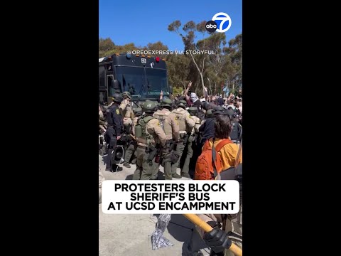 Protesters block sheriff's bus at UCSD encampment