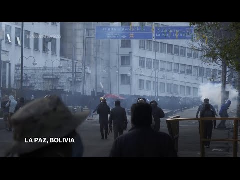 March led by Bolivian leader Evo Morales ends in clashes as it enters capital La Paz