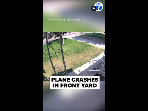 Plane crashes in front yard of home