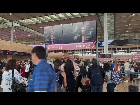 Flights delayed at Berlin airport as widespread technology outage causes disruption around world