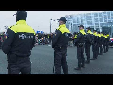 Police move climate protesters off highway in Amsterdam
