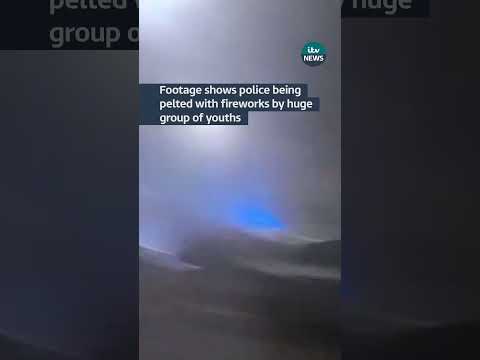 Bonfire night 'warzone' as car set alight and police attacked with fireworks #itvnews #manchester