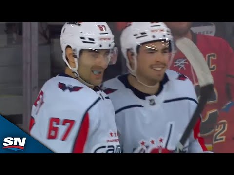 Capitals Lapierre Bats Home One-Timer Off INSANE Saucer Backhand Pass From Milano