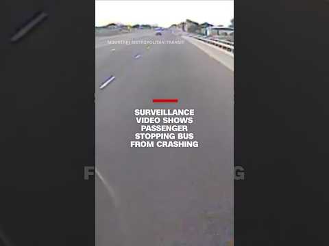 Surveillance video shows passenger stopping bus from crashing