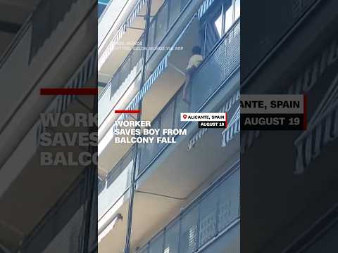Worker saves boy from balcony fall