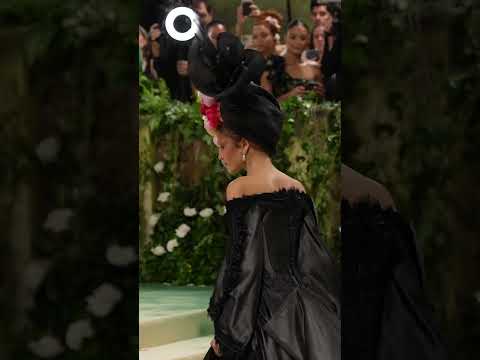 Zendaya changes into second outfit with giant train and flower hat on Met Gala 2024 red carpet