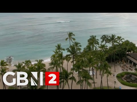 View of beach and hotel in Hawaii, after authorities issue tsunami warnings