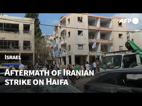 'Panic and anxiety' as Iranian missile hits Israeli coastal city of Haifa | AFP