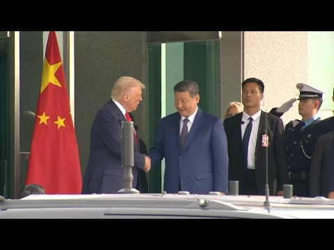Trump and Xi shake hands after talks | AFP