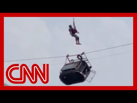 See moment a child was rescued from a dangling cable car