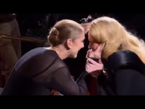 Emotional moment as Celine Dion and Adele embrace on stage