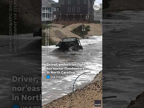Driver, pedestrian fight nor’easter floodwaters in Outer Banks