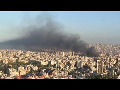 Huge plumes of smoke billow above Beirut's skyline following overnight Israeli strikes