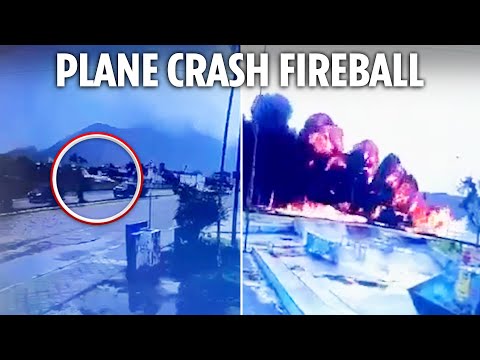 Horror moment plane explodes on beach after crashing across busy road at end of runway