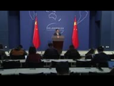 China denies 2 Canadians detained arbitrarily