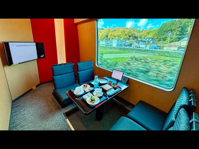 Image of Riding in a luxury sightseeing train's Japanese-style private room