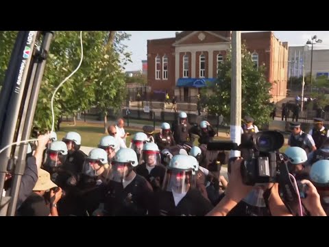 Protester being arrested outside the Democratic National Convention