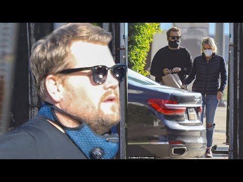 James Corden and his wife Julia Carey wear masks while picking up food amid California's COVID 19 lo