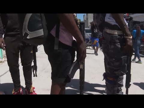 Gunfights continue in parts of Haitian capital as gang leader demands PM's arrest