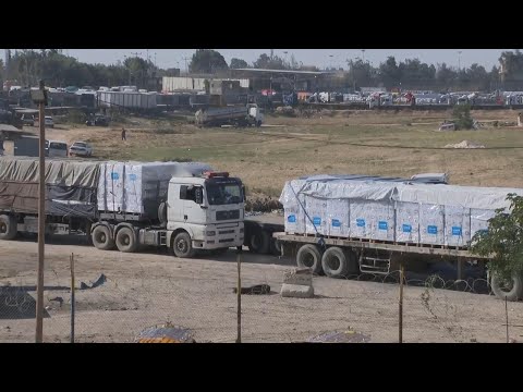 Aid trucks enter Gaza after Israel and Hamas extend truce at last minute