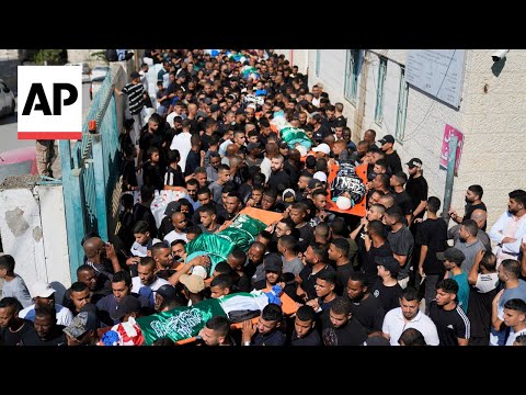 Funerals held for 18 Palestinians killed by Israeli strike in West Bank