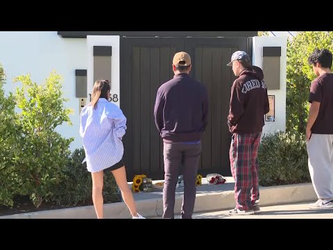 Matthew Perry fans pay their respects by leaving flowers in front of the late actor's doorstep