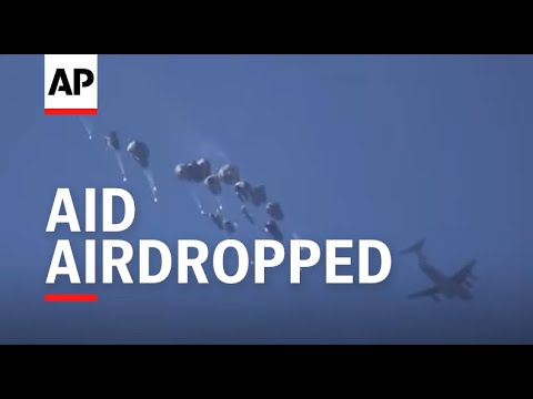 Hundreds gather in the beach southern Gaza Strip trying to get aid airdropped in the enclave