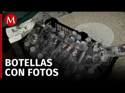 Reparten botellas de agua con fotografías de Luis Enrique y más desaparecidos