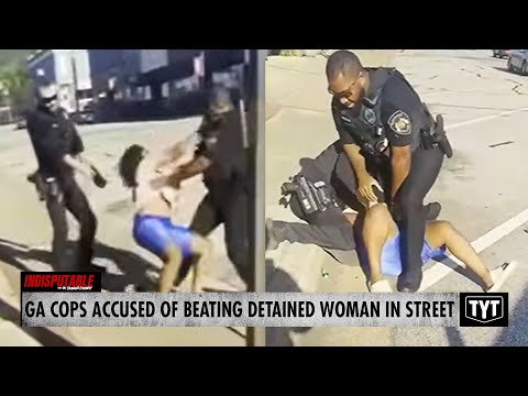 Cop With Violent History Accused Of Beating Detained Woman In Street