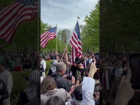 Counter protesters waving USA FLAGS BLAST “Born in the USA” at the University of Chicago.