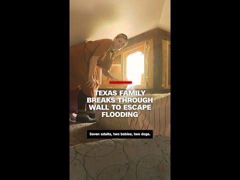 Texas family breaks through wall to escape flooding