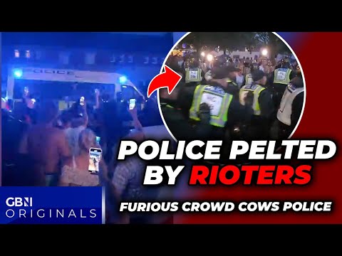 WATCH: Police PELTED by furious RIOTERS as cops LOSE CONTROL of British street