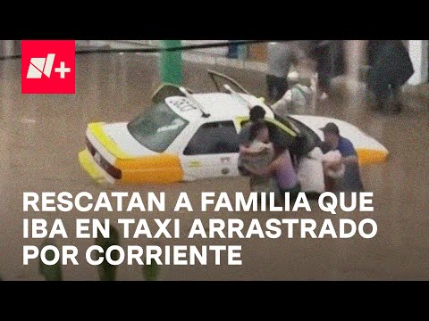 Guardia Nacional rescata en Acapulco a una familia que iba en taxi arrastrado por la corriente